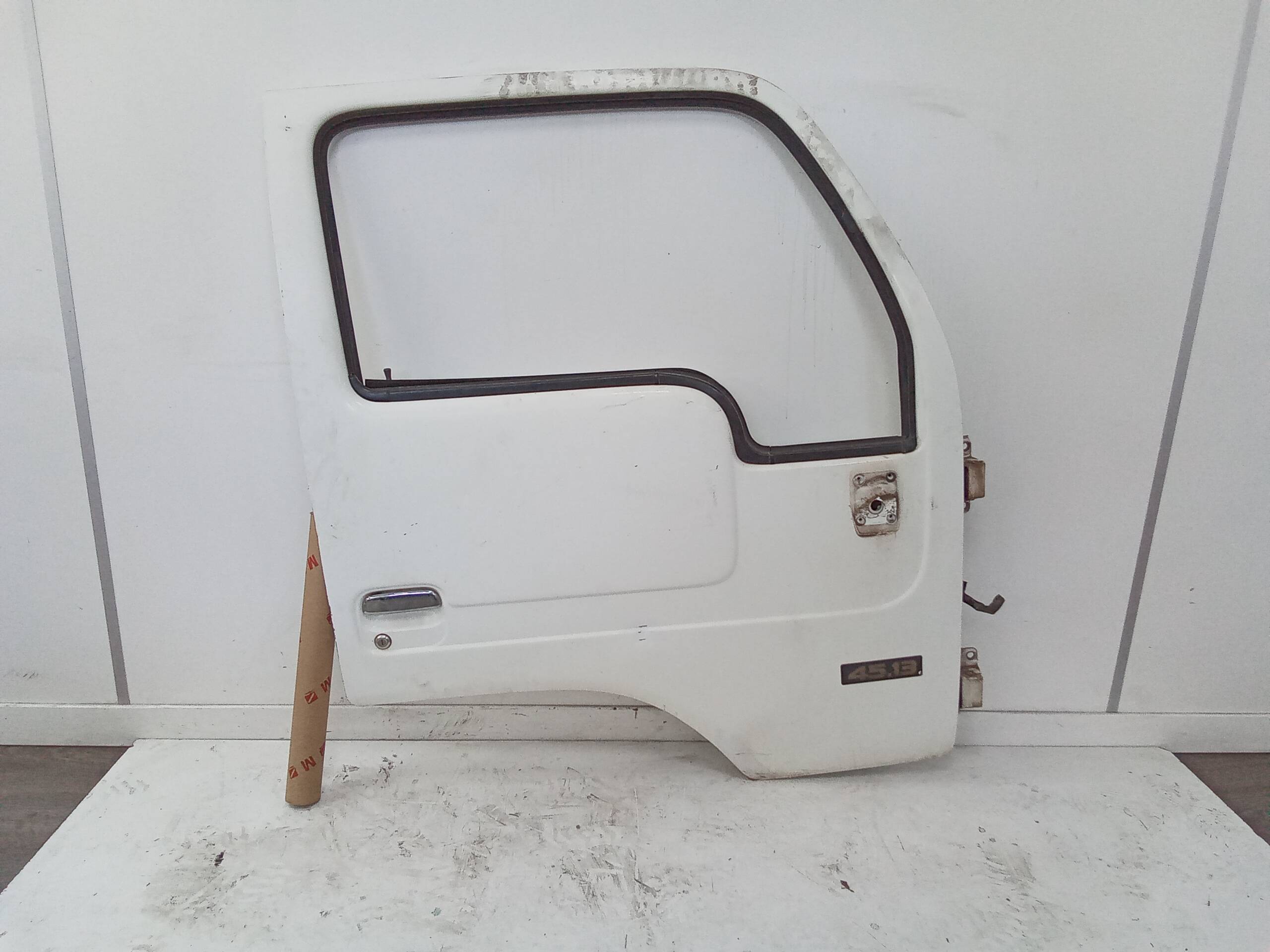 Puerta delantera derecha nissan cabstar 01.04 ->